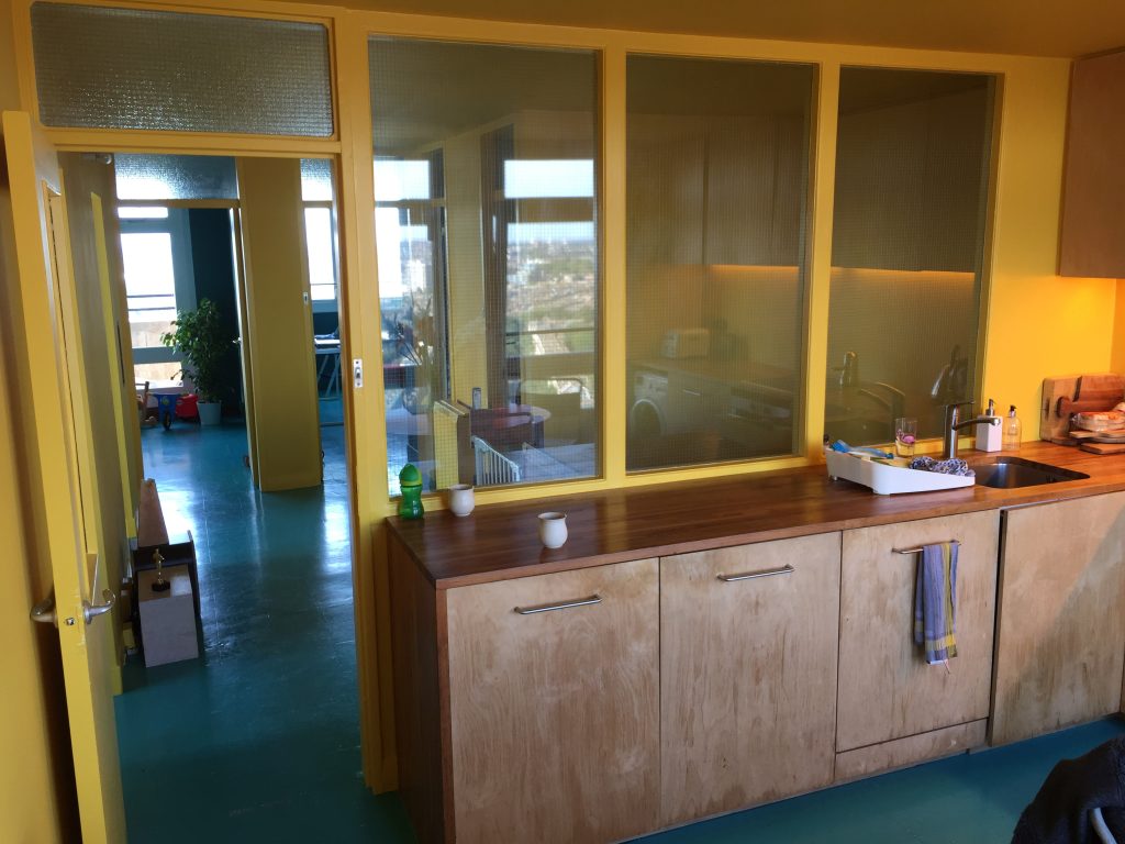 a kitchen with a sink and a window
