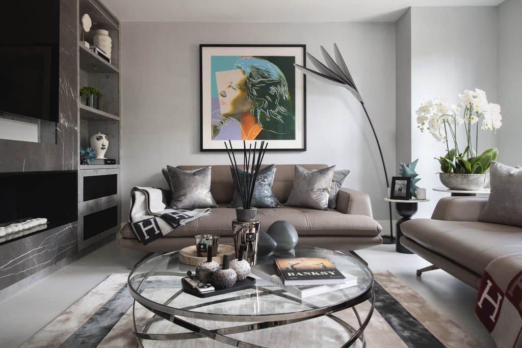 a living room filled with furniture and a fireplace