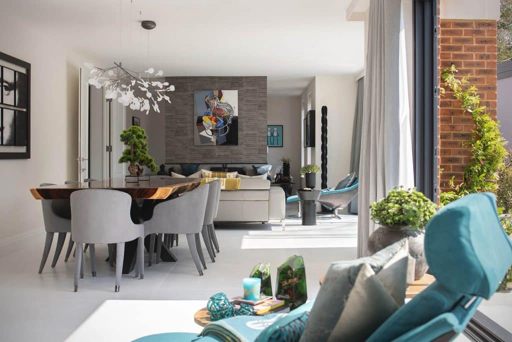 a living room filled with furniture and a fire place