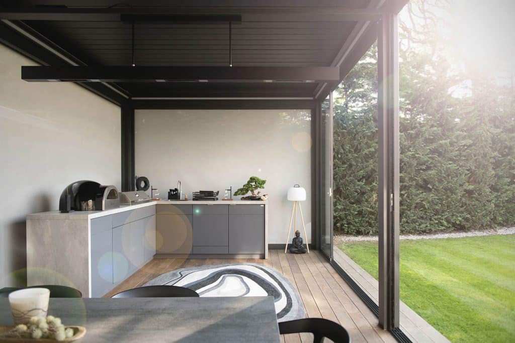 a room filled with furniture and a large window