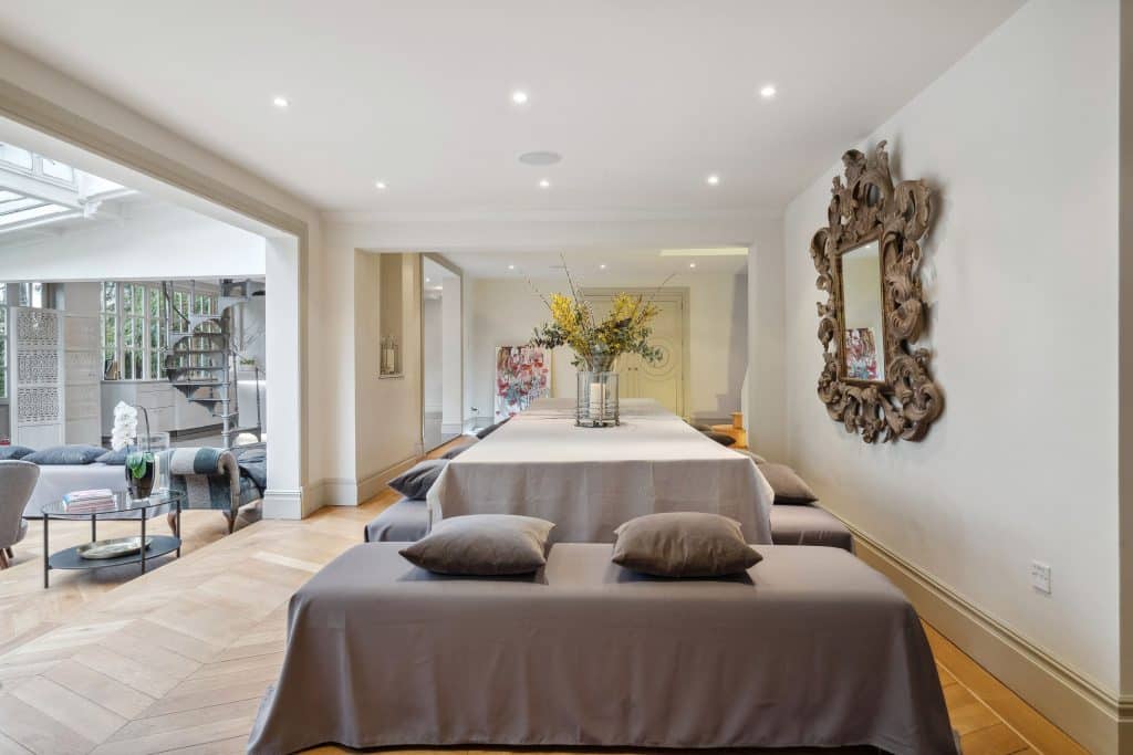 a bedroom with a large bed in a room