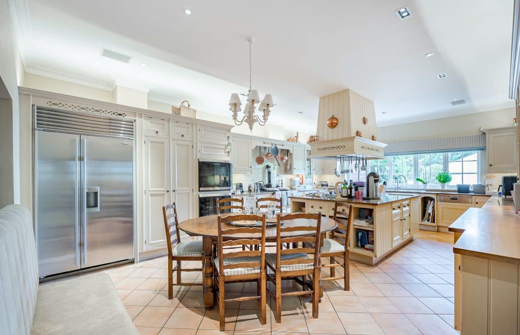 a kitchen with a dining room table