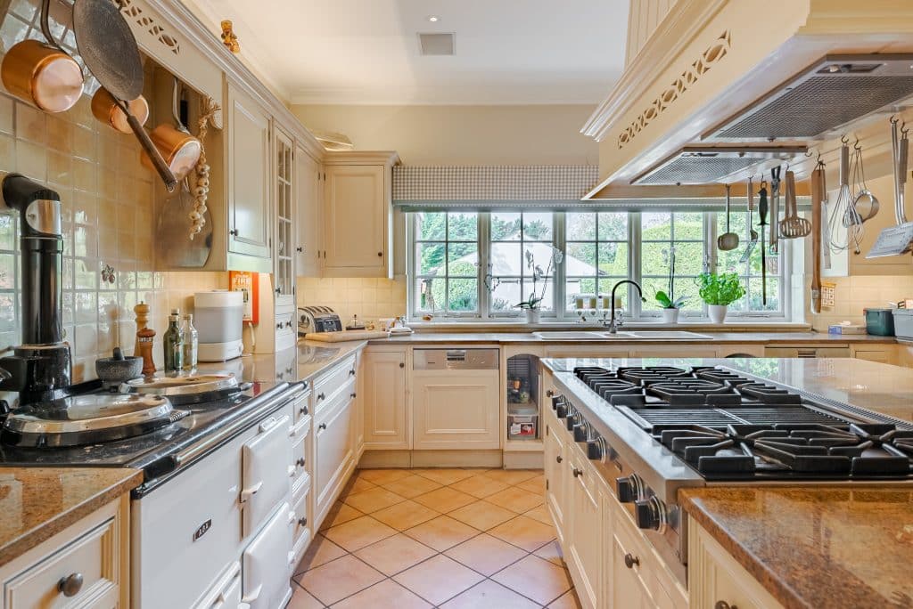 a kitchen with a stove top oven