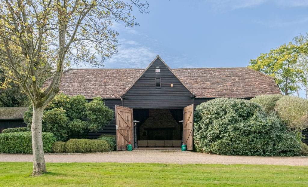a house with trees in the background
