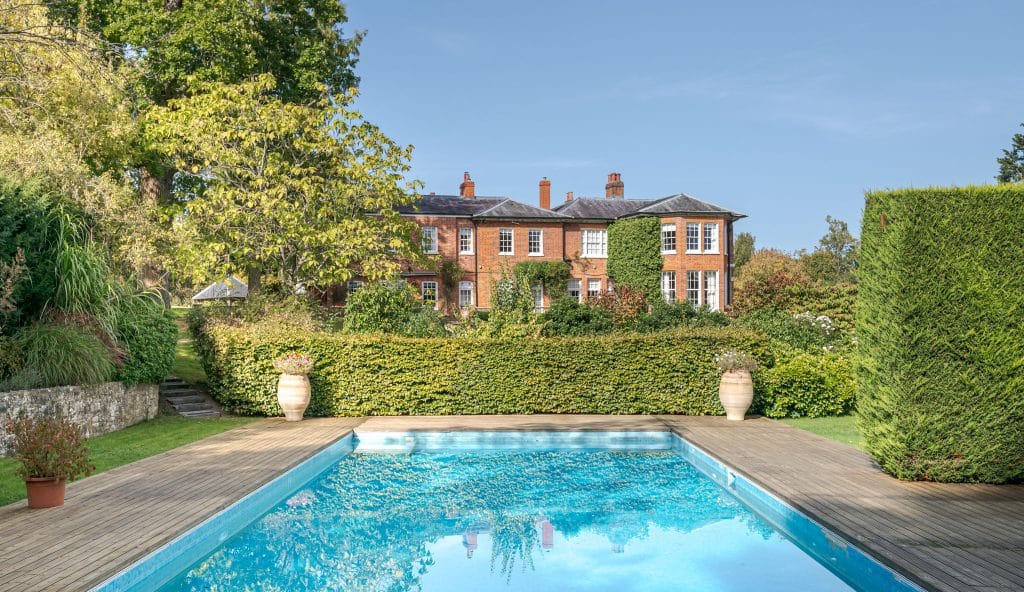 a pool next to a building