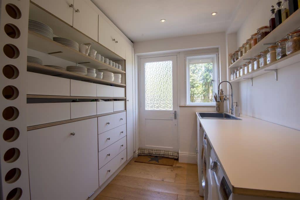 a kitchen with a sink and a window