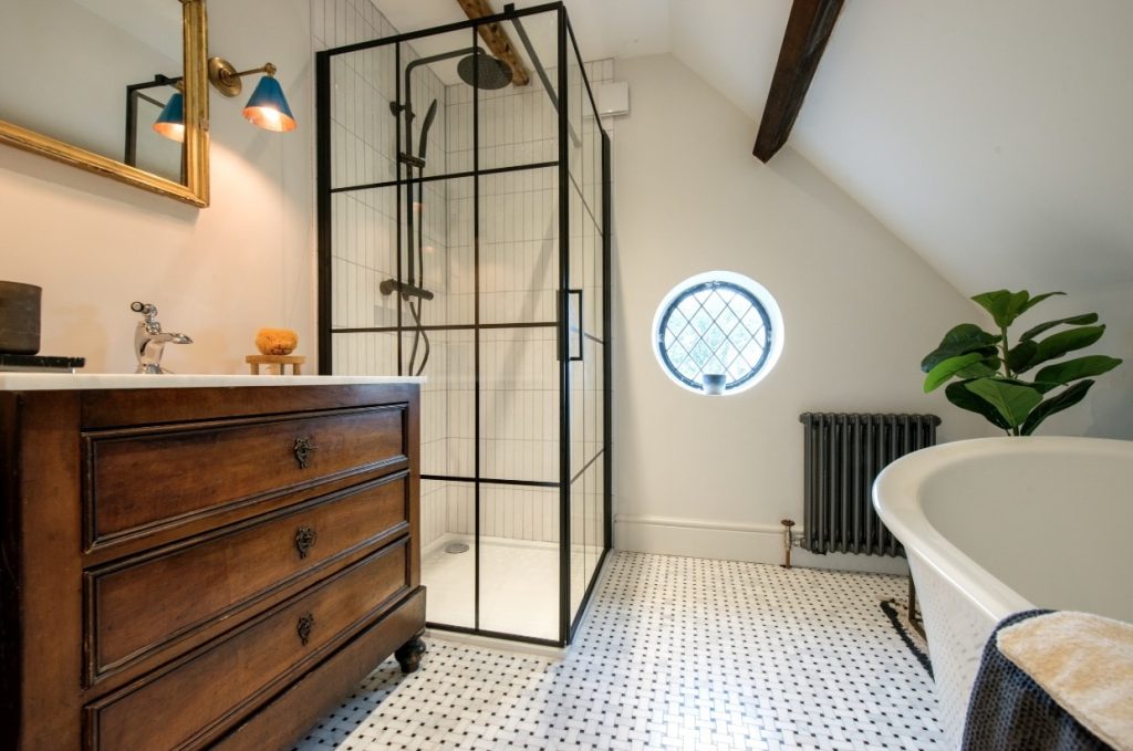a room with a sink and a mirror