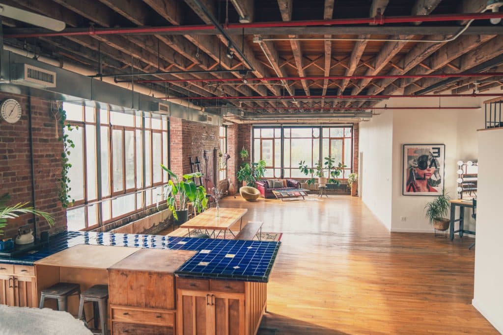 a living room filled with furniture and a fireplace