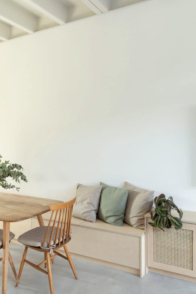 a living room with a couch and a chair