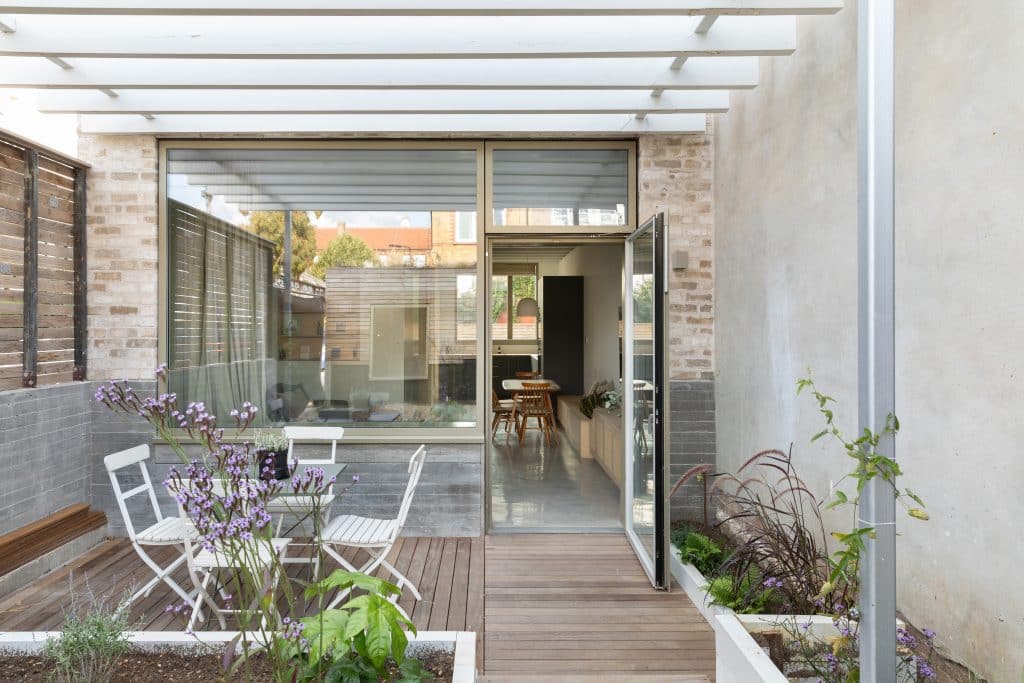 a fire place sitting in a garden