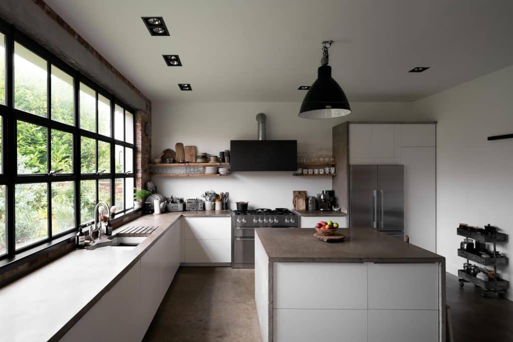 a kitchen with a sink and a window