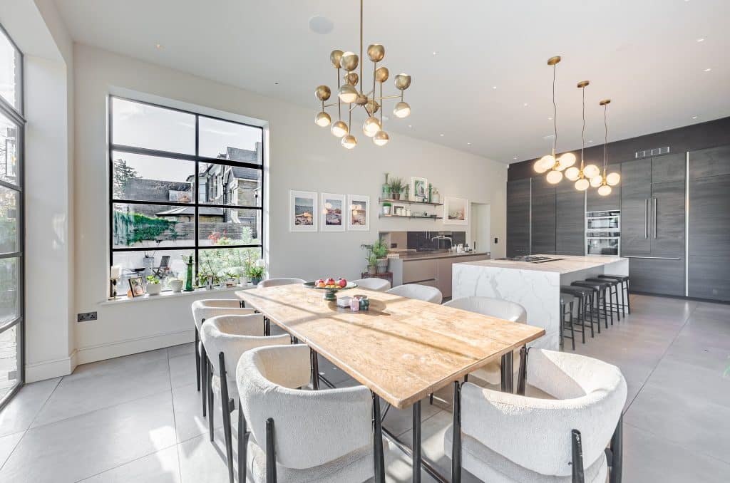 a kitchen with an island in the middle of a room