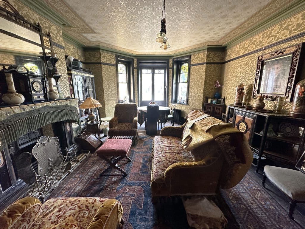 a living room filled with furniture and a fire place