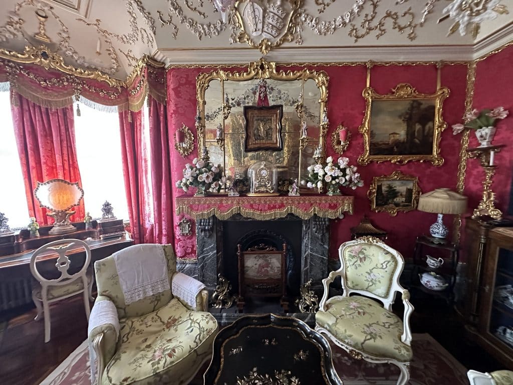 a room filled with furniture and a fire place