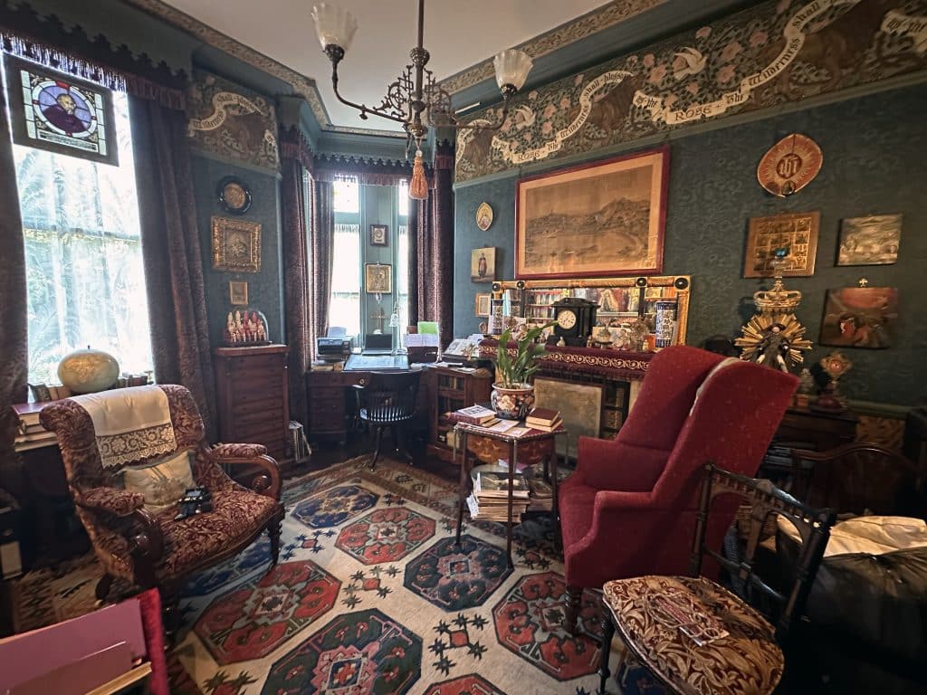 a living room filled with furniture and a fire place