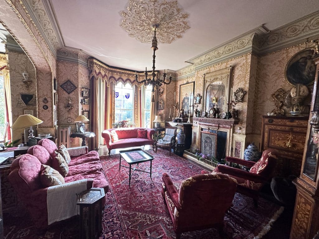 a living room filled with furniture and a fire place
