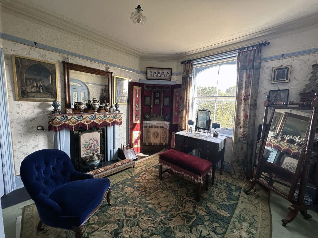 a living room filled with furniture and a fireplace