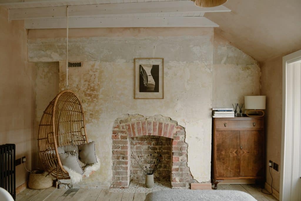a room filled with furniture and a fire place