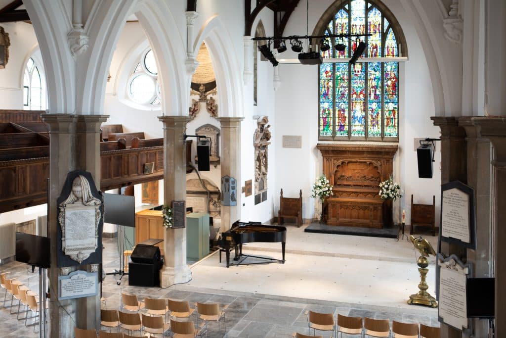 a living room filled with furniture and a fire place