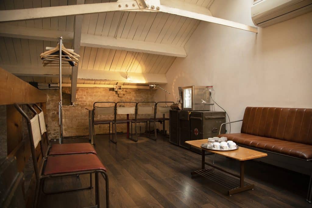 a room filled with furniture and a table