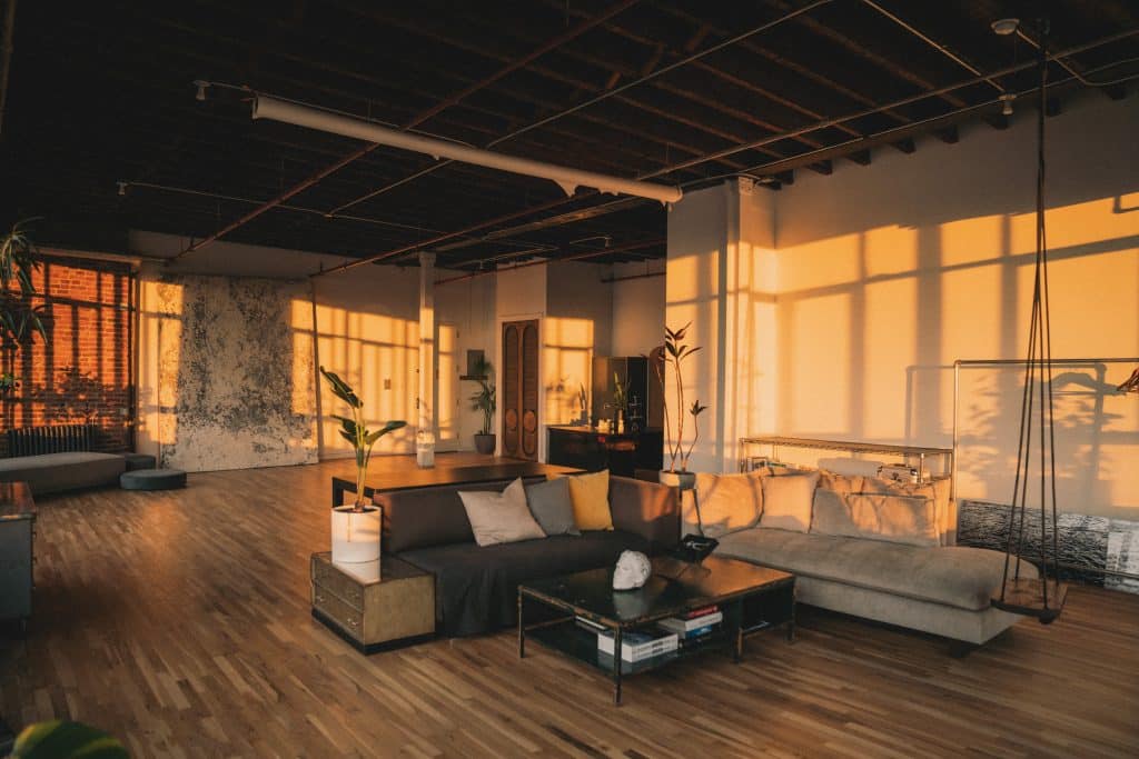 a living room filled with furniture and a fireplace