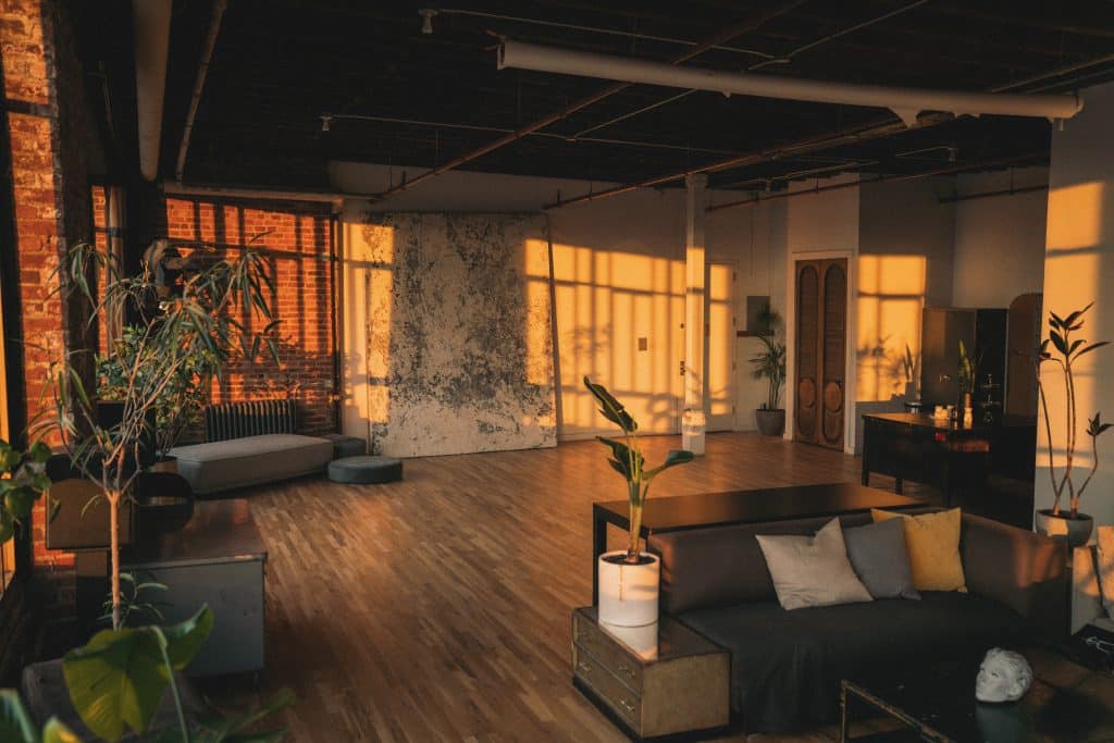 a living room filled with furniture and a fireplace