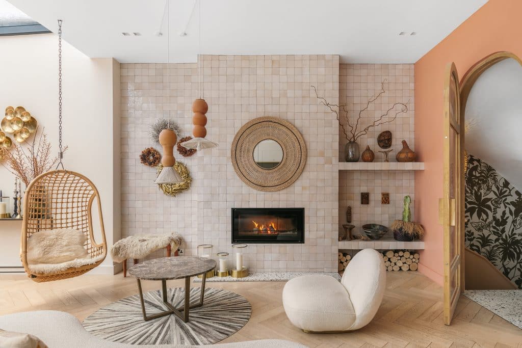 a living room filled with furniture and a fireplace