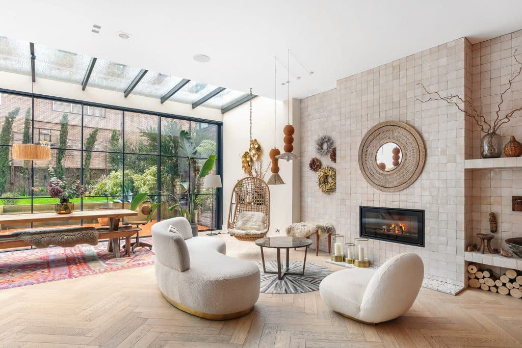 a living area with a building in the background