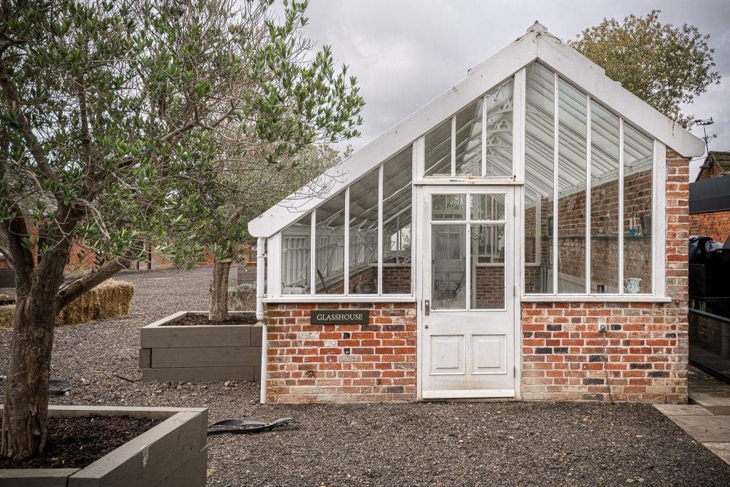 THE WALLED GARDEN cobham country shoot location Location Creation The Walled Garden The Glass House entrance