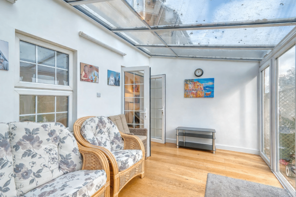 PINNER HOUSE Harrow location house family home Bright conservatory with modern furnishings