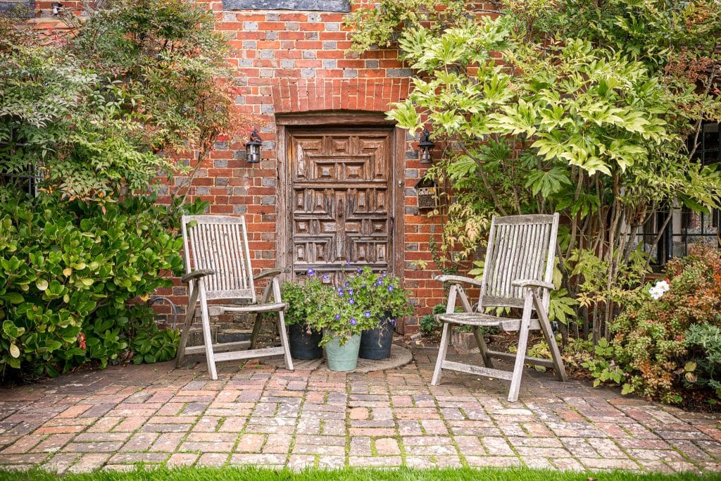 THE LAKE HOUSE 15th century guildford country location house Location Creation:Lake House:garden seats